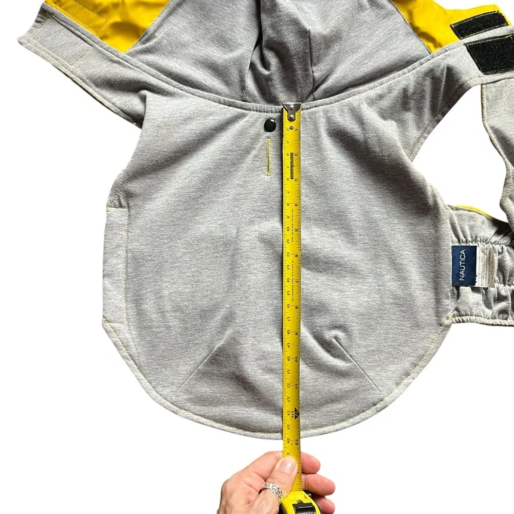Nautica Dog Raincoat size medium. With snap back hood